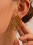 NANYUKI | Boucle d'oreille en acier inoxydable doré – Design solaire et audacieux | Oseraa.com