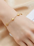Bracelet Kyoto en acier inoxydable doré avec pendentifs cœurs. O-dace.com