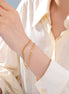 Bracelet Manille en acier inoxydable doré duo de chaînes. O-dace.com