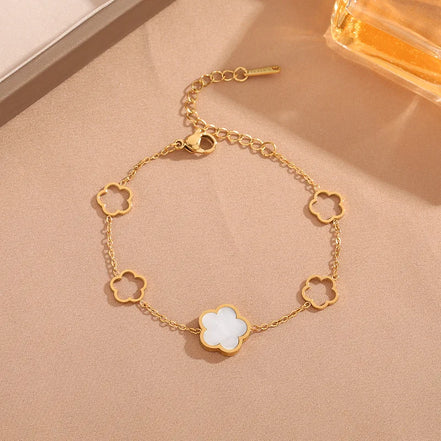 Bracelet Shanghai en acier inoxydable doré motif fleur blanche o-dace.com