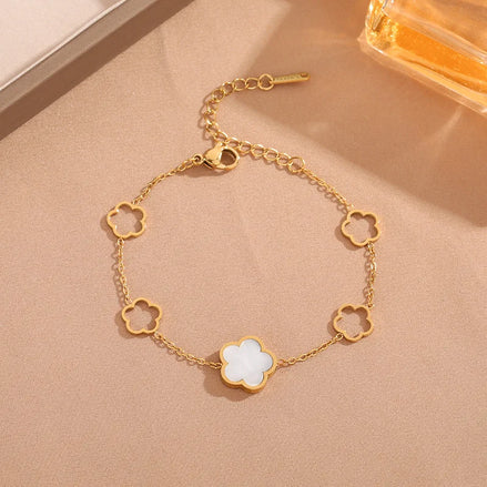 Bracelet Shanghai en acier inoxydable doré motif fleur blanche o-dace.com