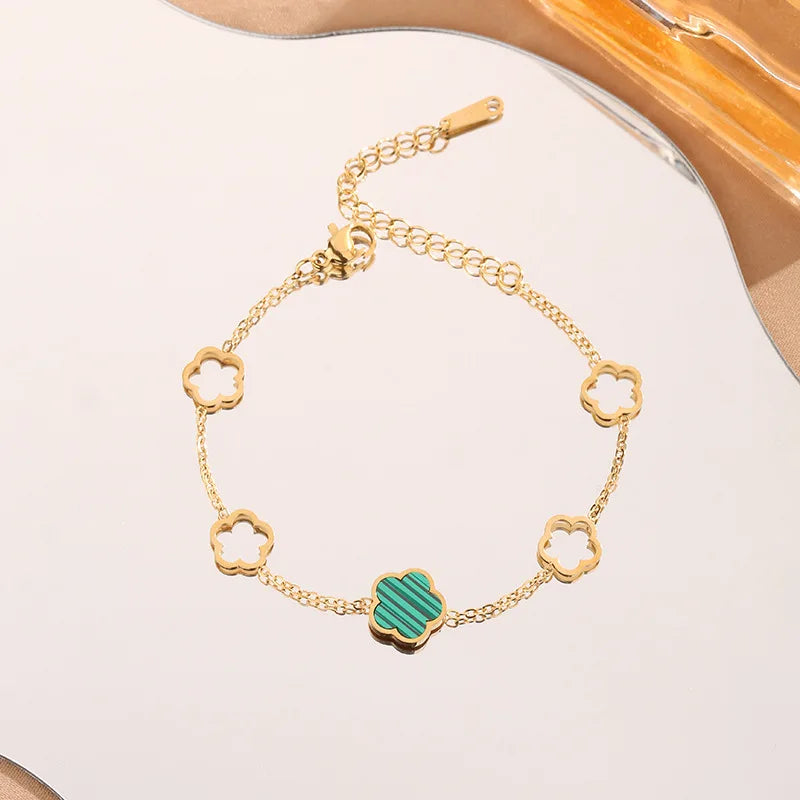 Bracelet Shanghai en acier inoxydable doré motif fleur dur - o-dace.com